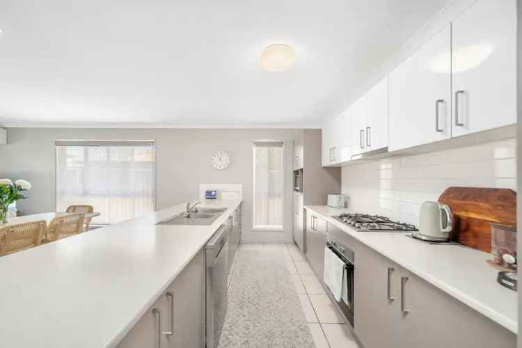 Modern 4-Bedroom Home Low Maintenance Living Murrumba Downs