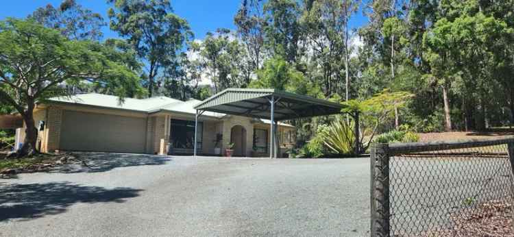 Rent 4 Bedroom Acreage Property with 3 Sheds in Jimboomba