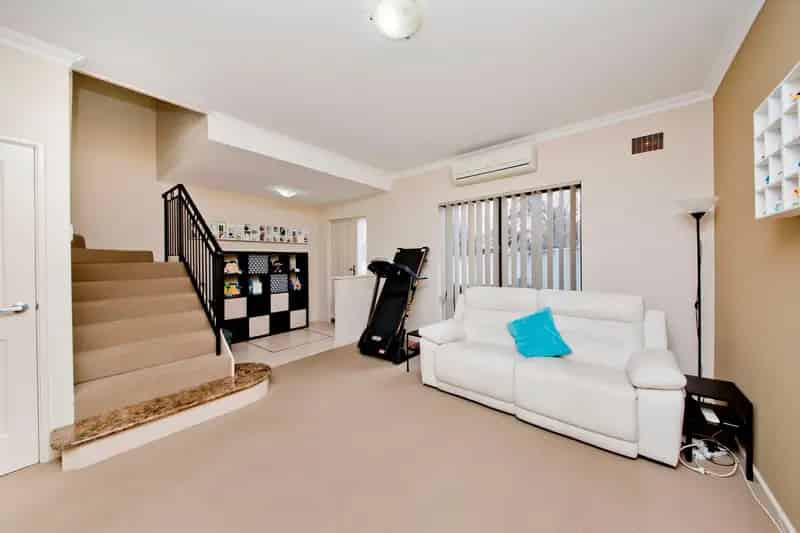 Buy Townhouse in Sought After Location with Three Bedrooms and Courtyard