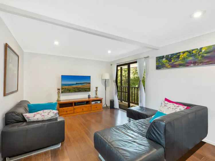 Substantial split level home on private 853sqm block; excellent potential for dual occupancy