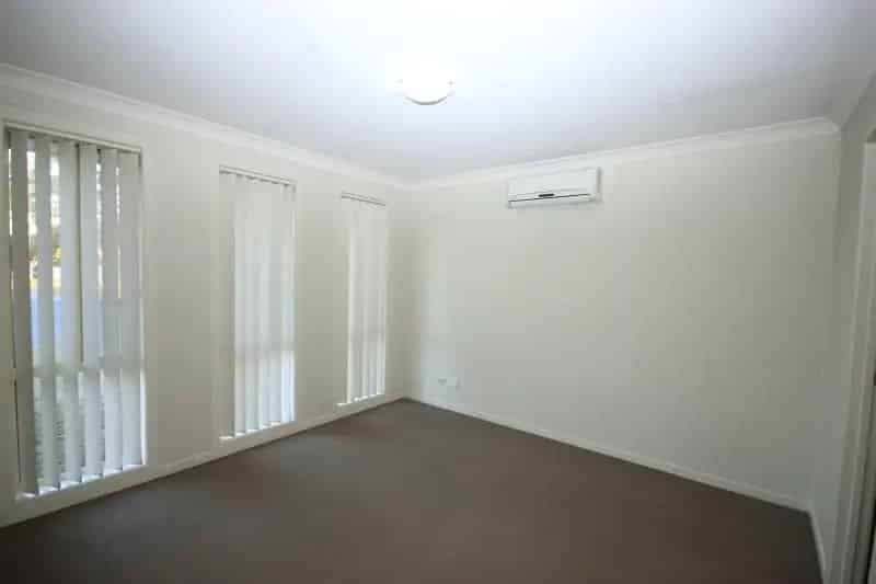 Lease Spacious House in Gorokan Featuring 4 Bedrooms and Air Conditioning