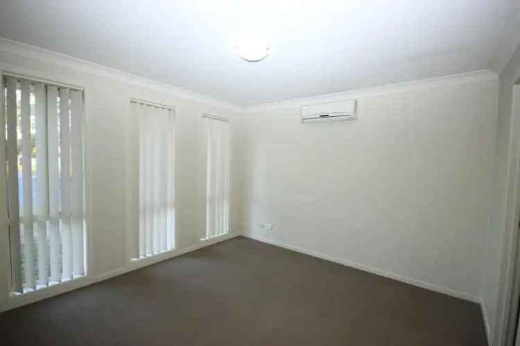 4 Bed House Gorokan NSW - Ensuite, Aircon, Double Garage