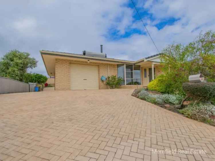 Large Family Home with Multiple Living Areas and Garaging Near CBD