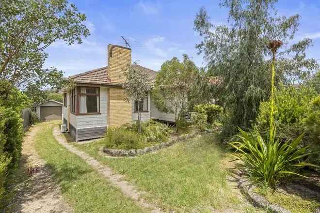 Charming Home with High Ceilings and Hardwood Floors