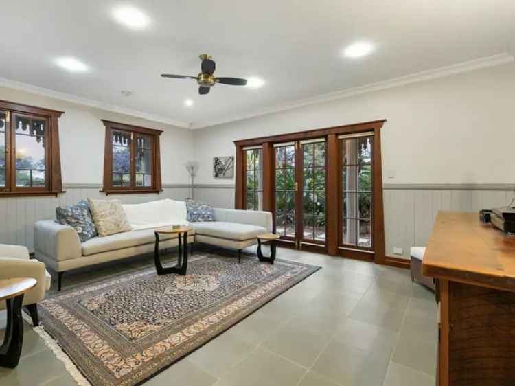 Buy Family Queenslander with Dual Living and Pool in Elevated Position