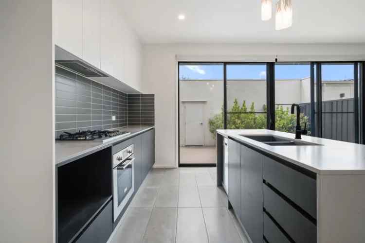 Modern Double-Story Townhouse with two large courtyards