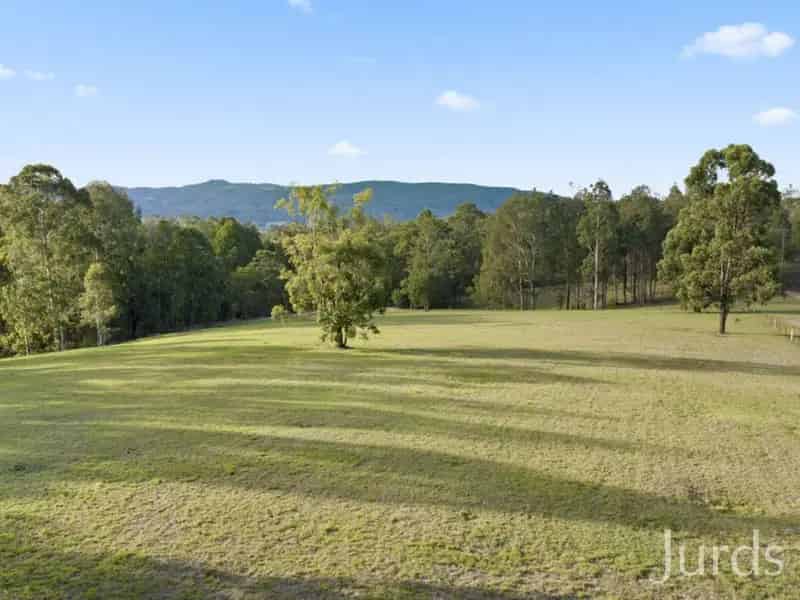 Buy Rural Property in Millfield with Stunning Views and Outdoor Features