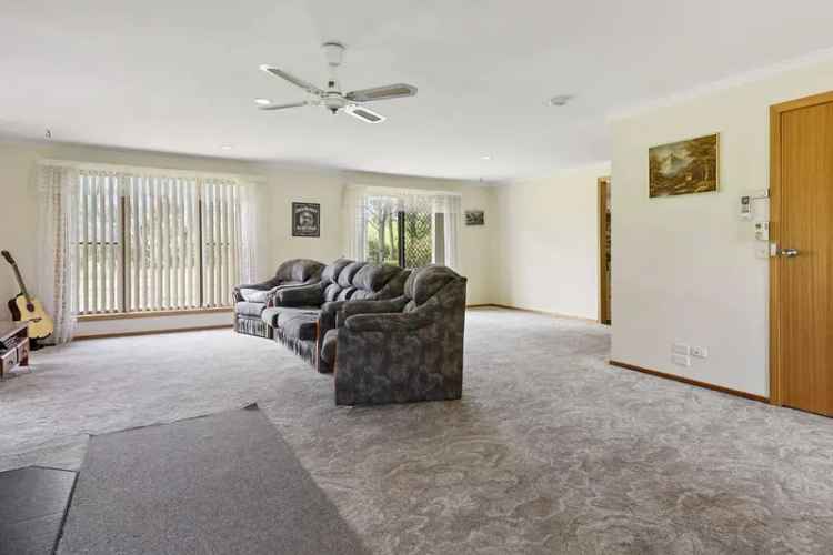 Buy spacious family home with sheds in Smithton