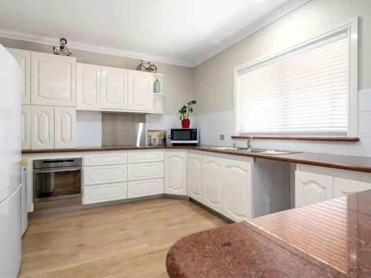 Two-Bedroom Home with Large Shed and Car Hoist