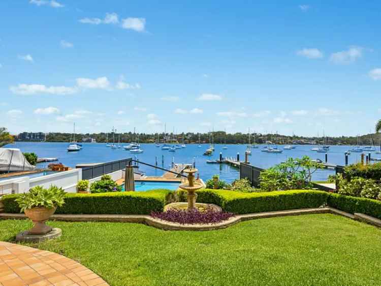 Waterfront Family Home with Stunning Bay Views and Private Jetty