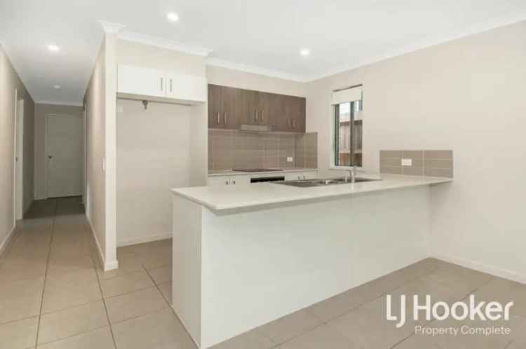 Family Home  Four Bedrooms Two Living Areas Modern Kitchen Double Garage