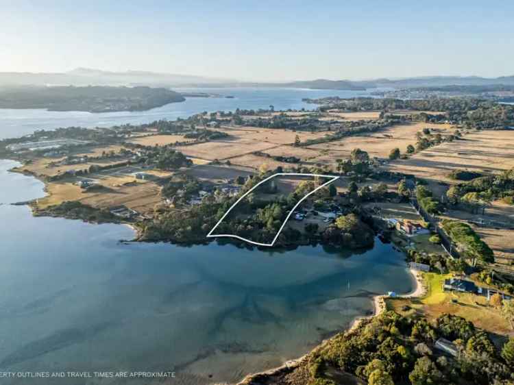 Idyllic waterfront acreage privately hidden away