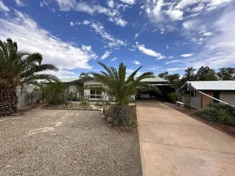 Three Bedroom, One Bathroom Home with 8 kw's solar and an updated kitchen.