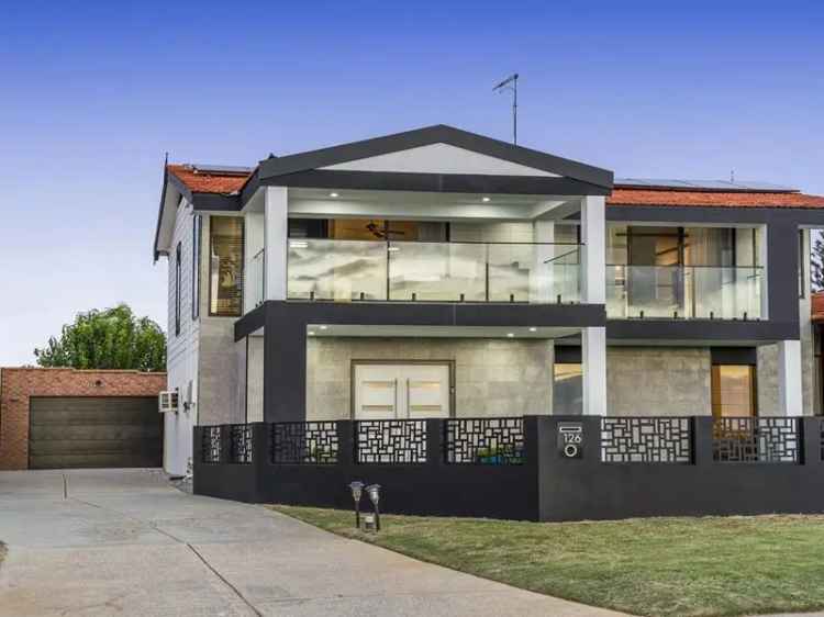 Luxury 5-Bedroom Beachfront Home with Ocean Views and Play Area