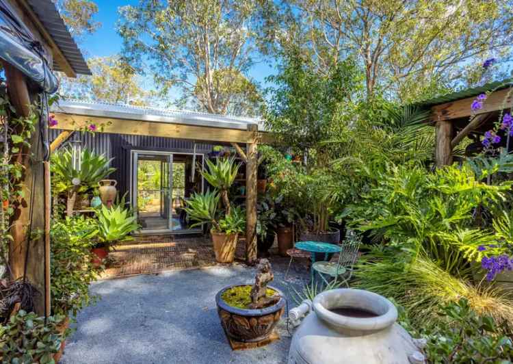 Rent two bedroom cottage with caravan in peaceful Tinonee