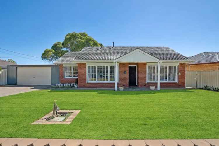 Buy family home in Morphett Vale with large block and modern features