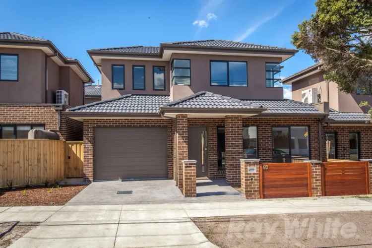 Stylish, Warm & Inviting Double Story Townhome