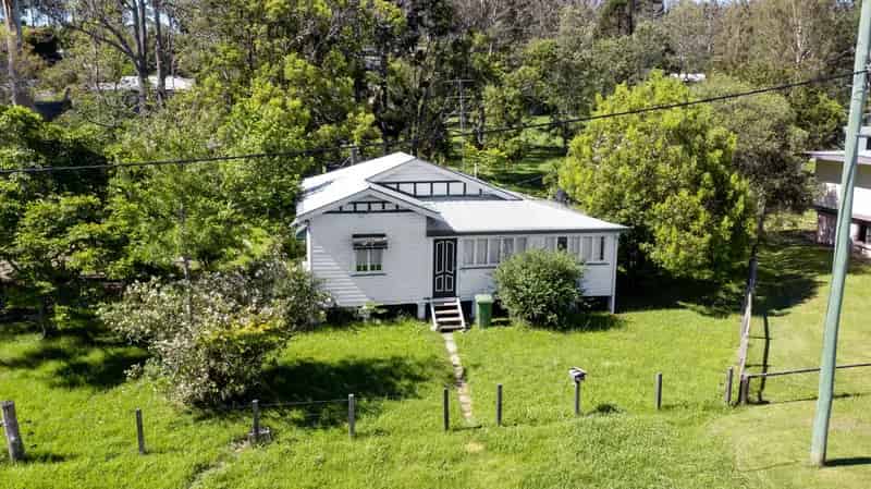 Buy homestead in Urbenville with spacious backyard and serene views