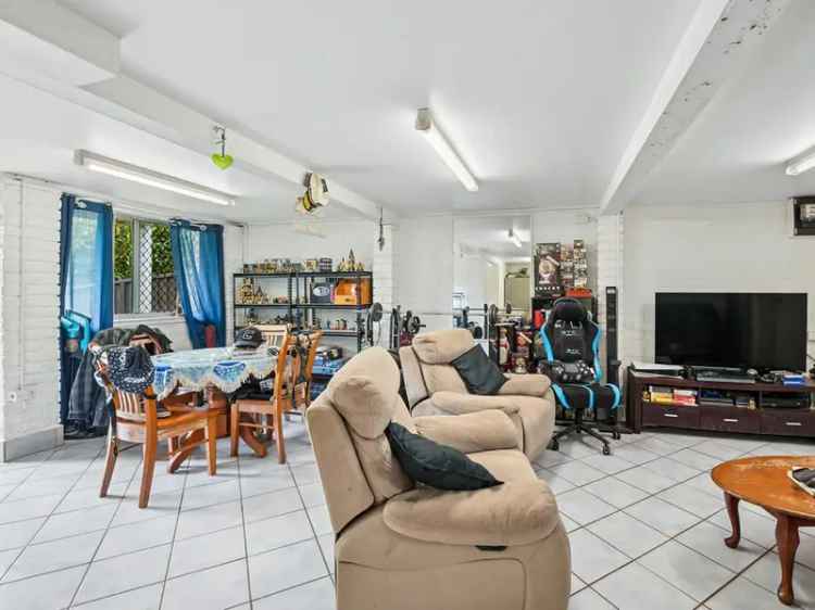 Buy home in quiet street near CBD with modern features and gardens