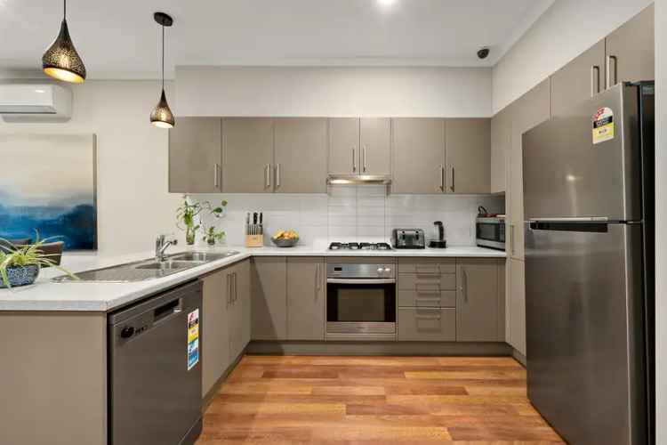 Buy Townhouse in Glenelg North with Modern Design and Five Bedrooms