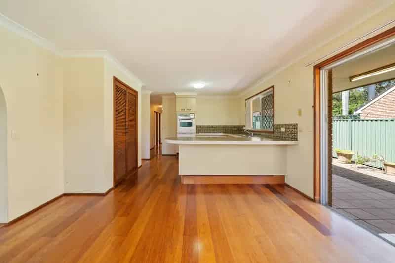 Buy family home in Carrara with corner block and potential