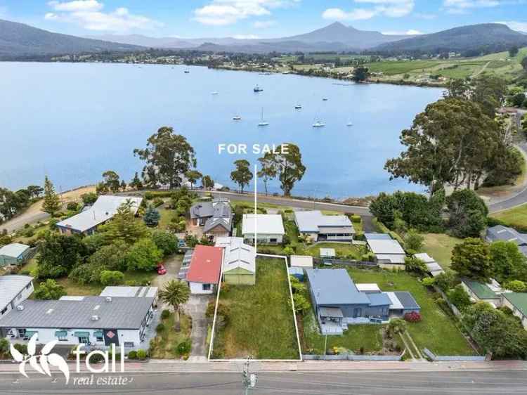 Land + huge garage + beach views!