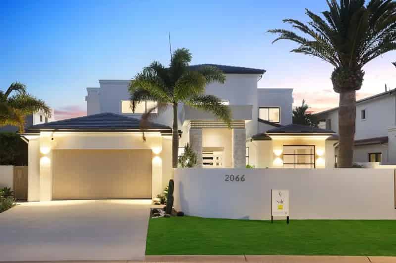 Buy Waterfront Luxury House in Sanctuary Cove with Pool and Garden