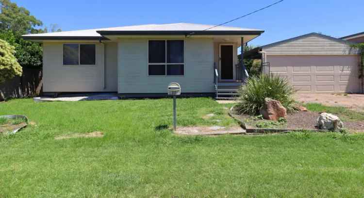 Buy Stylish Family Home with Pool in Dalby Featuring Open Plan Living