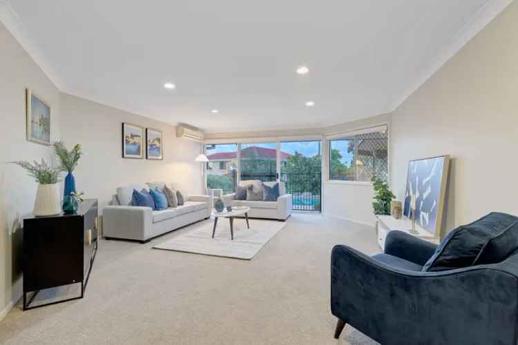 Spacious Family Living with Poolside Views in Stretton College Catchment!