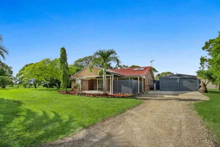 Rent rural property near pristine beaches and Richmond River with gardens