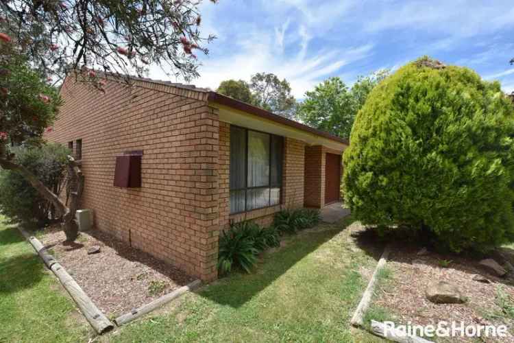 Spacious 2 Bedroom Brick Veneer Unit with Garage and Backyard