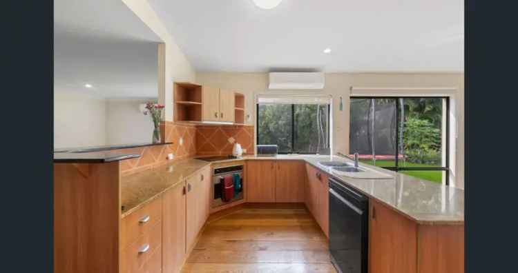 Robina Paradise: 4-Bedroom Home on 931m2 Block