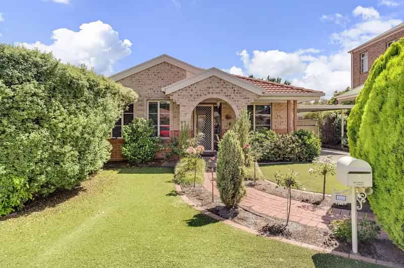 Buy Home in Golf Estate Holt with Renovated Kitchen and Sunroom