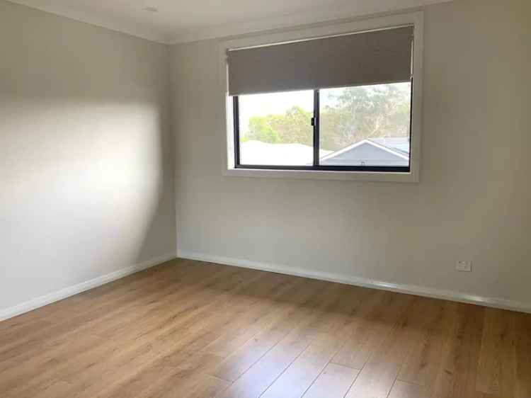 Lease 4 Bedroom House in Campbelltown with Modern Kitchen and Yard