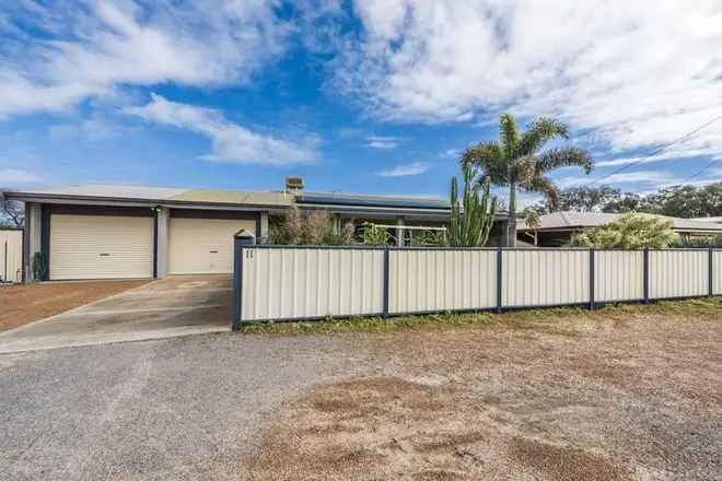 5 Bedroom 2 Bathroom Home with Double Garage and Workshop Near Sunset Beach