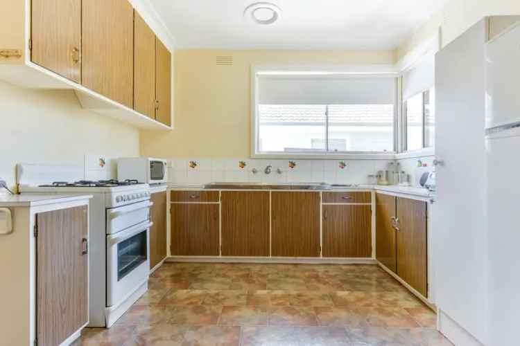 Charming 1970's brick home on a large block.
