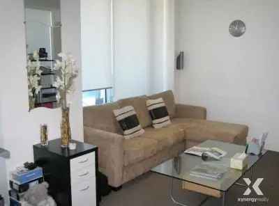 Spacious 1-Bedroom Apartment in Melbourne's QV Shopping Centre