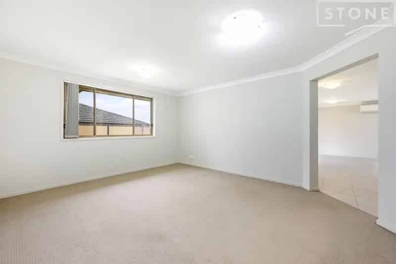 Lease Modern Four Bedroom House in Cessnock with Backyard and Garage