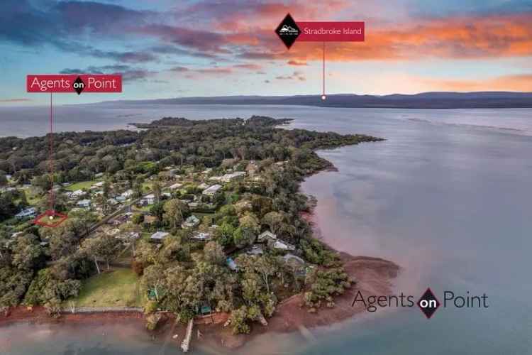 BUILD YOUR DREAM HOME ON THIS SERENE BLOCK OF LAND WITH BREATHTAKING WATER VIEWS