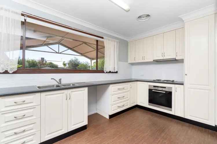 Buy Family Home in Coolamon with Spacious Rooms and Modern Features