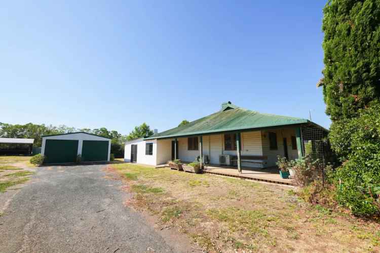 Buy House in Parkes with Historic Charm and Spacious Living Areas