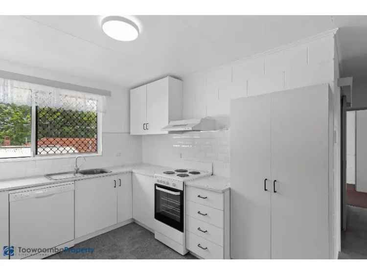 Walk To The Toowoomba Base Hospital! Renovated, Low Maintenance City Living!