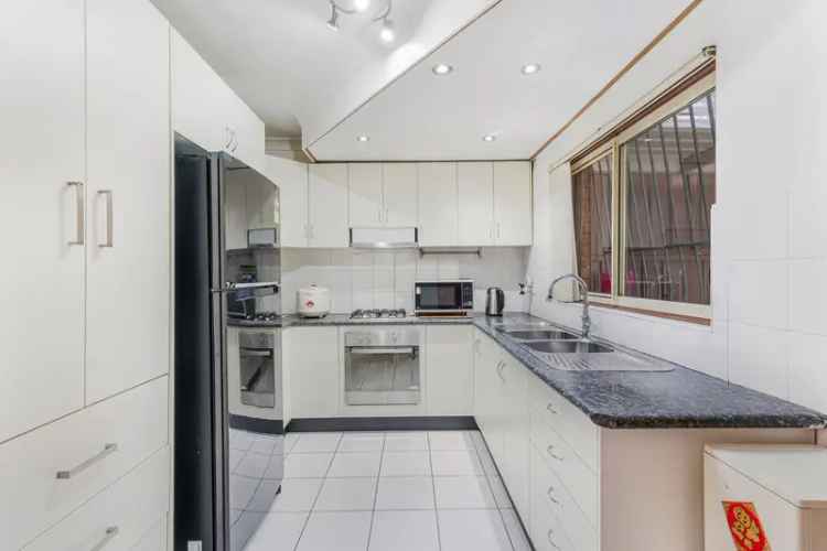 SOLD BY -  RAY WHITE CABRAMATTA