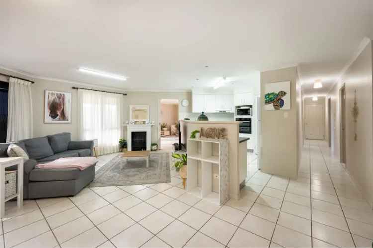 Buy Family Home in Woolgoolga with Spacious Layout and Outdoor Areas