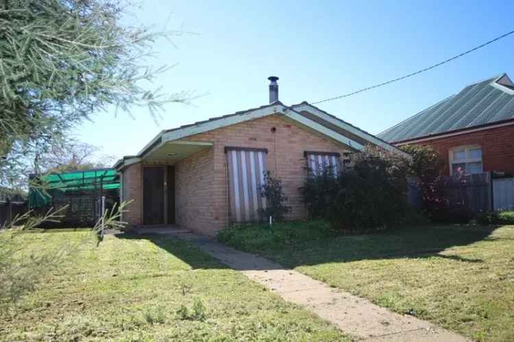 Buy house in medical precinct location with 3 bedrooms and garden shed