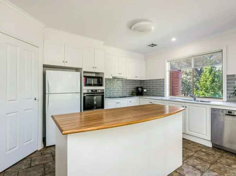 Buy Family Home in Spring Gully with Heated Pool and Spacious Living Areas