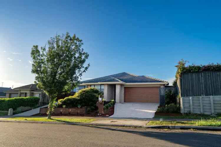 Four Bedroom Brick Home with Side Access and Expansive Outdoor Area