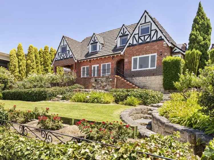 Elegant Tudor Home with River Views and Subdivision Potential