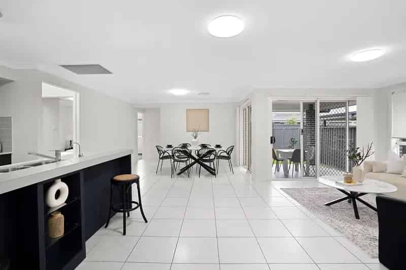 AN IMPECCABLY DESIGNED 4 BEDROOMS, 2 BATHROOMS, DOUBLE GARAGE FAMILY HOME ON 375 SQM EAST FACING LAND.