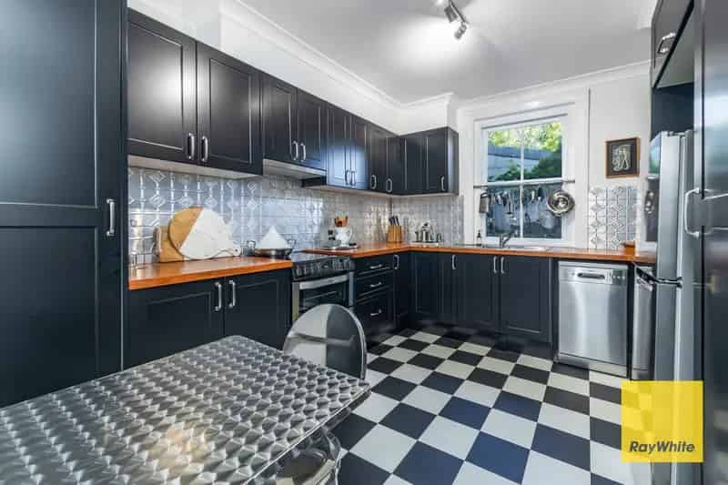 Charming three bedroom cottage for sale in a peaceful corner of town